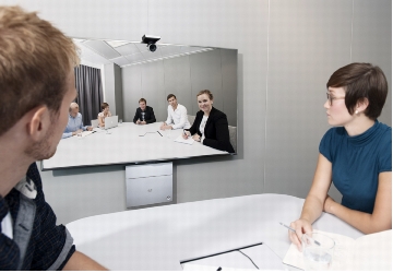 Figure 1. Cisco TelePresence SX20 Quick Set in a Small Meeting Room Environment